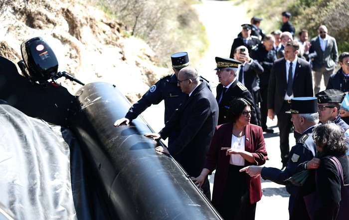 Shabana Mahmood inspects a smuggler's small boat after signing deal with France