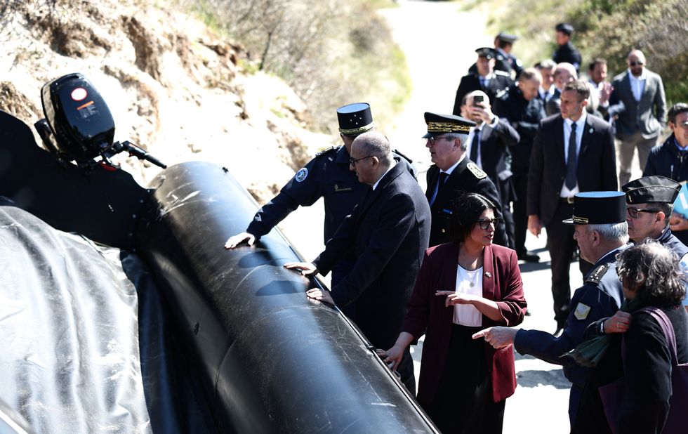 Shabana Mahmood inspects a smuggler's small boat after signing deal with France