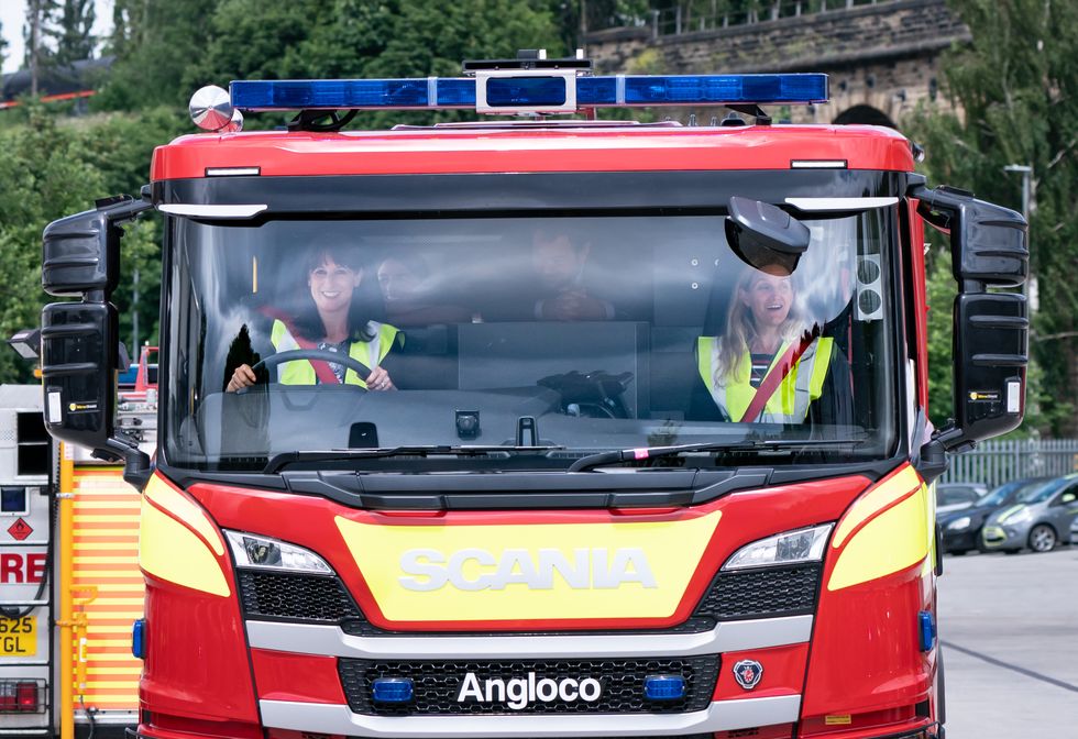 Shadow chancellor Rachel Reeves (left) drives a fire engine, with Labour's candidate in the Batley and Spen by-election, Kim Leadbeater (right), during a visit to Angloco, which makes fire engines and rescue vehicles that are used around the country and the world, while on the campaign trail ahead of the by-election on July 1. Picture date: Thursday June 24, 2021.