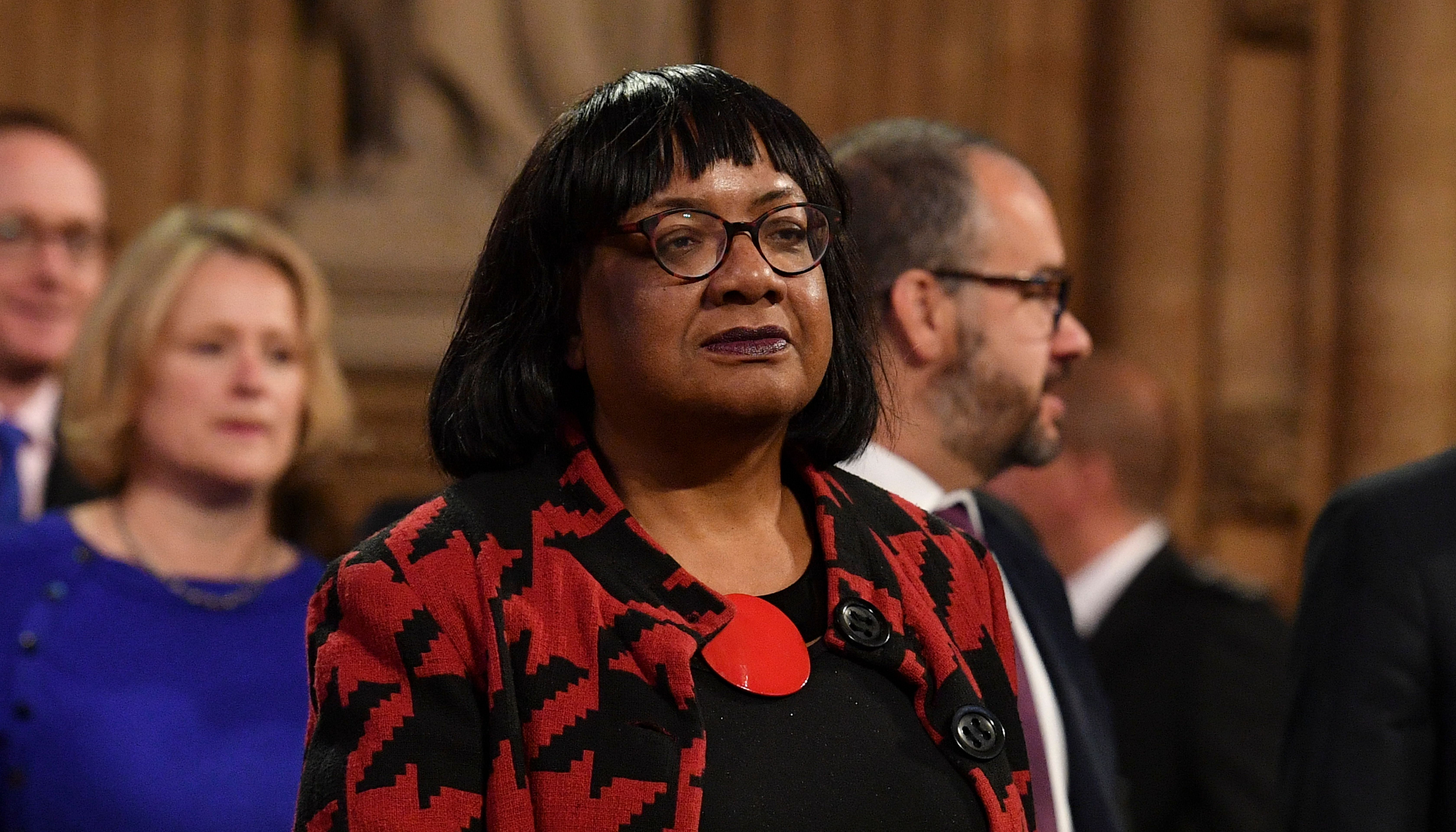 Shadow Home Secretary Diane Abbott in the Central Lobby as she walks back to the House of Commons after the Queen's Speech during the State Opening of Parliament ceremony in London.