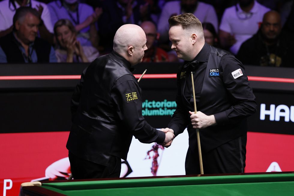 Shaun Murphy foi levado ao limite por John Higgins em um emocionante confronto do Campeonato Mundial de Snooker