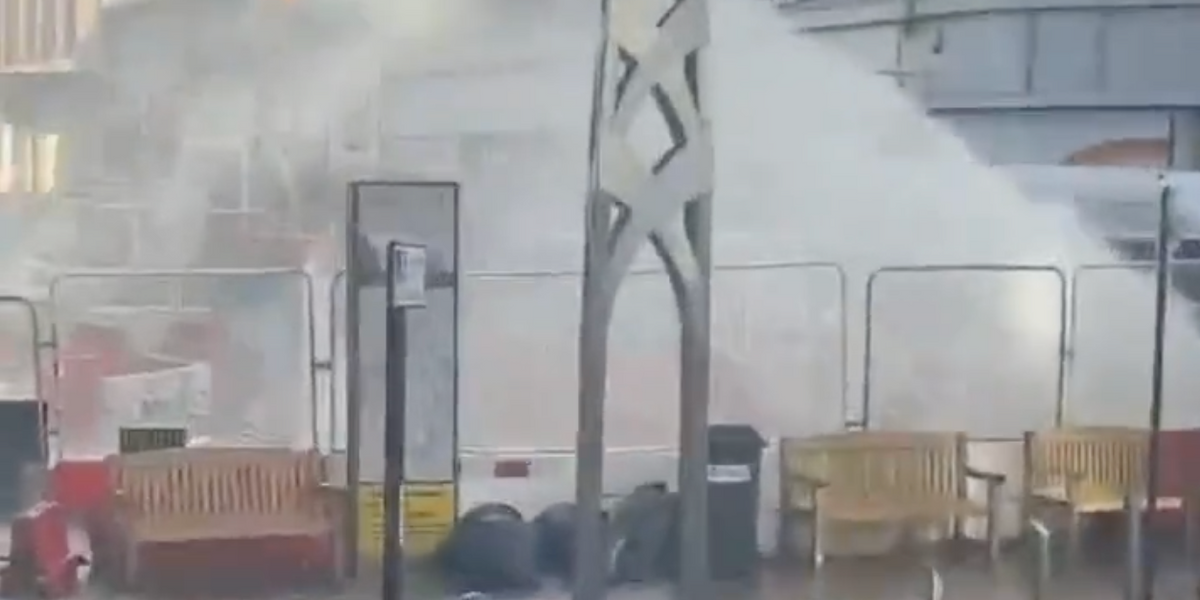 NextImg:Sheffield city centre floods as burst water main sends gallons of water racing down street