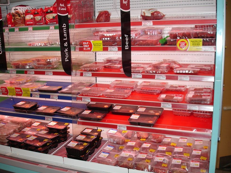 Shelves with meat in a shop