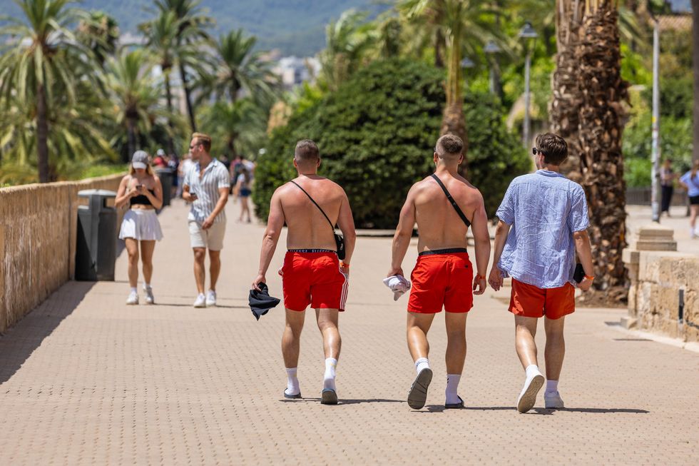 Shirtless in spain