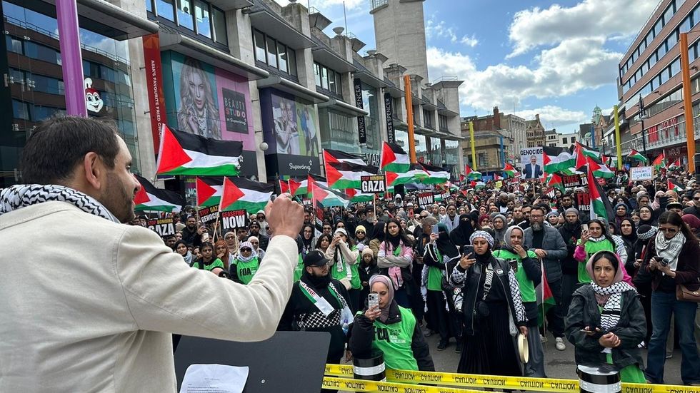 Shockat Adam campaigning with pro-Palestine protesters