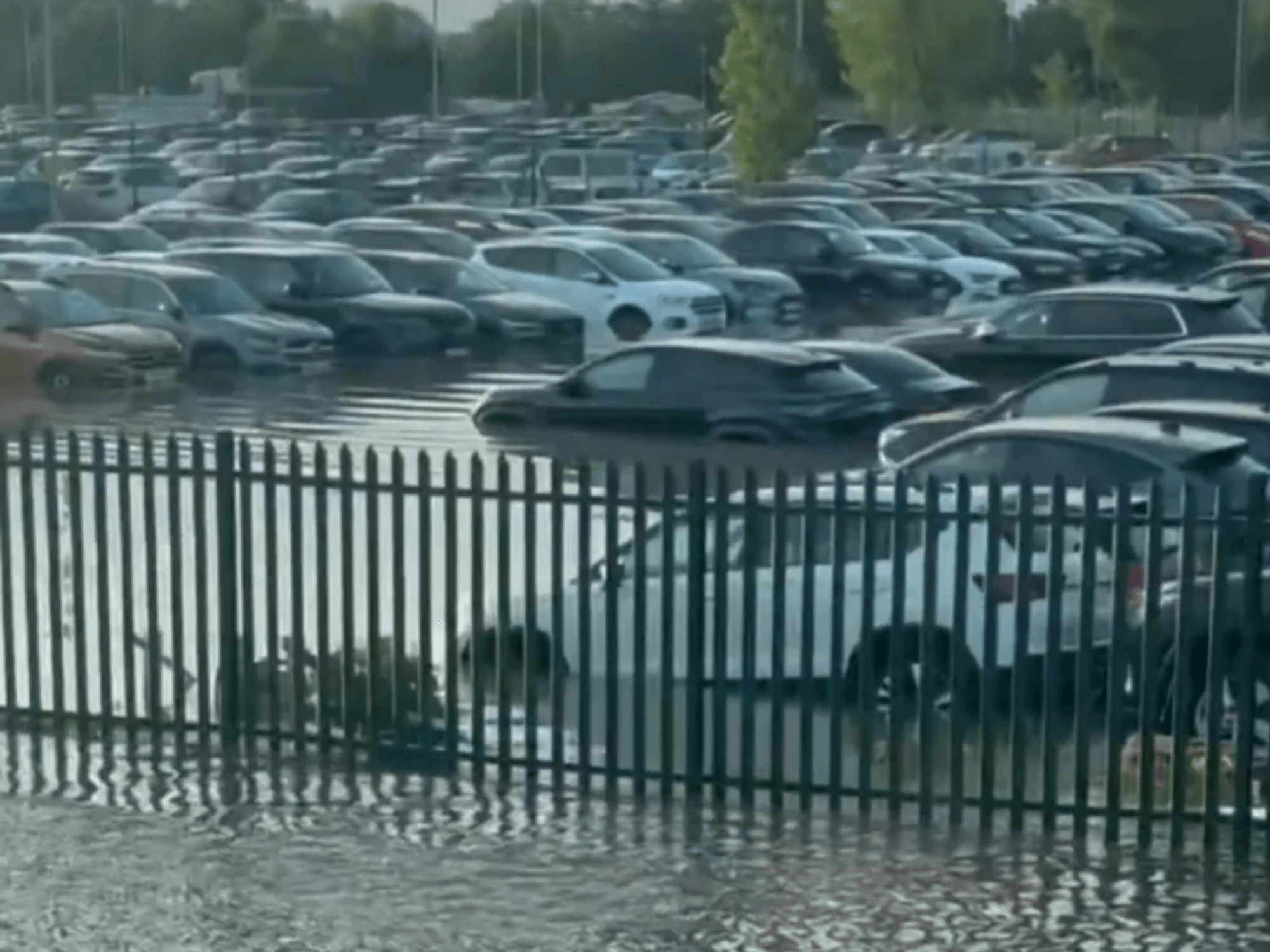 Shocking images captured the dramatic extent of the water-logged parking area