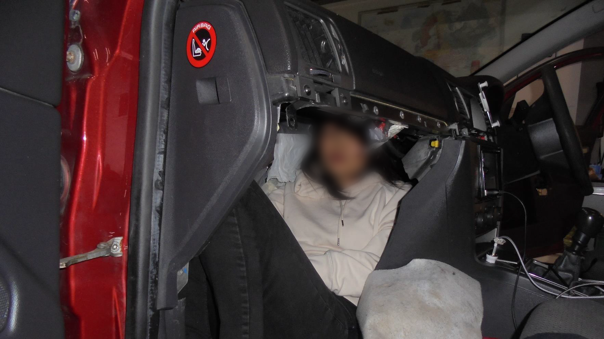 People smuggler jailed after using hidden compartment behind DASHBOARD to cram Vietnamese migrant into car