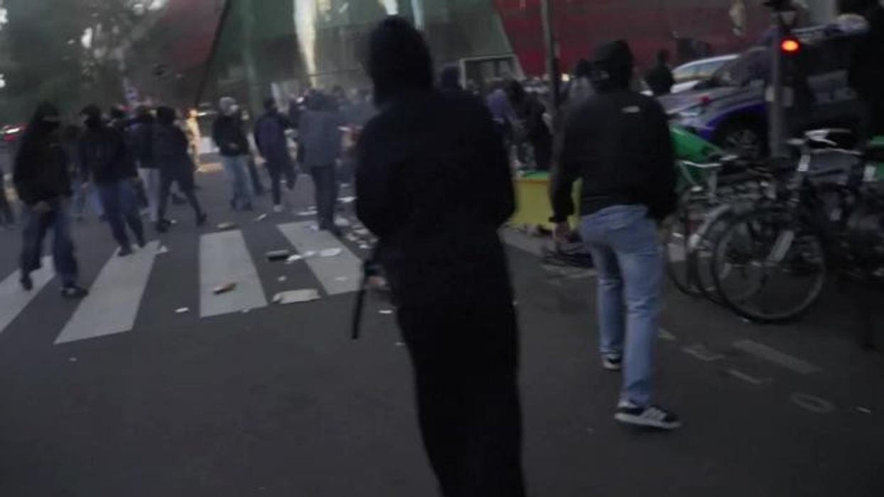 Shocking video shows moment chaos erupts in France as riot police hurl tear gas at protesters in street battle