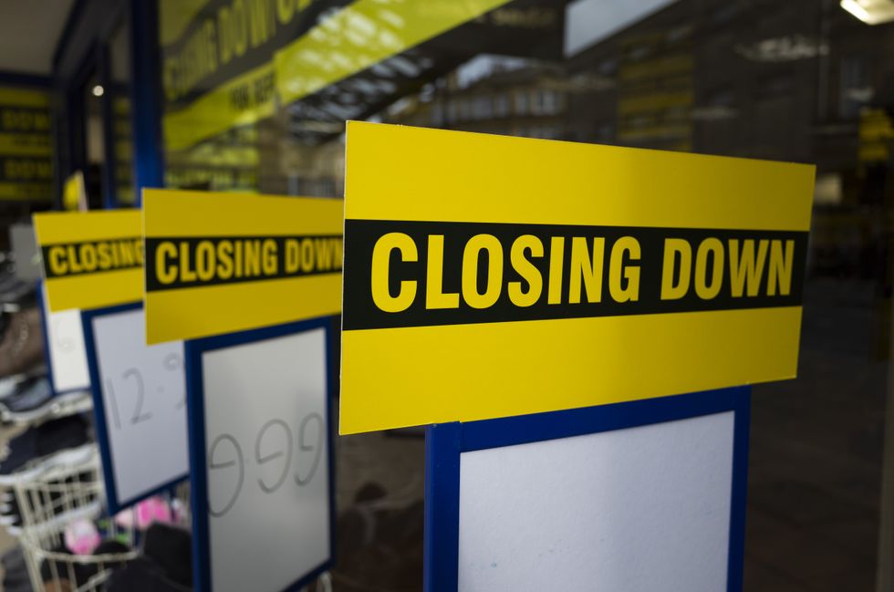 Shoezone store closed signs