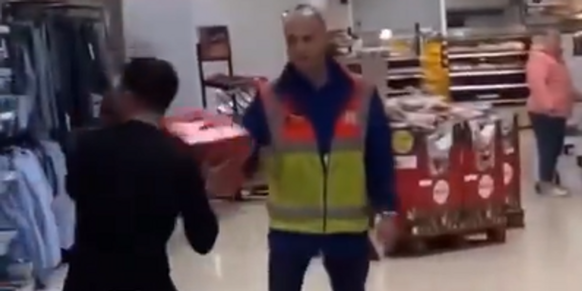NextImg:Tesco shopper throws crates of beer at security guard's face before being tackled to ground