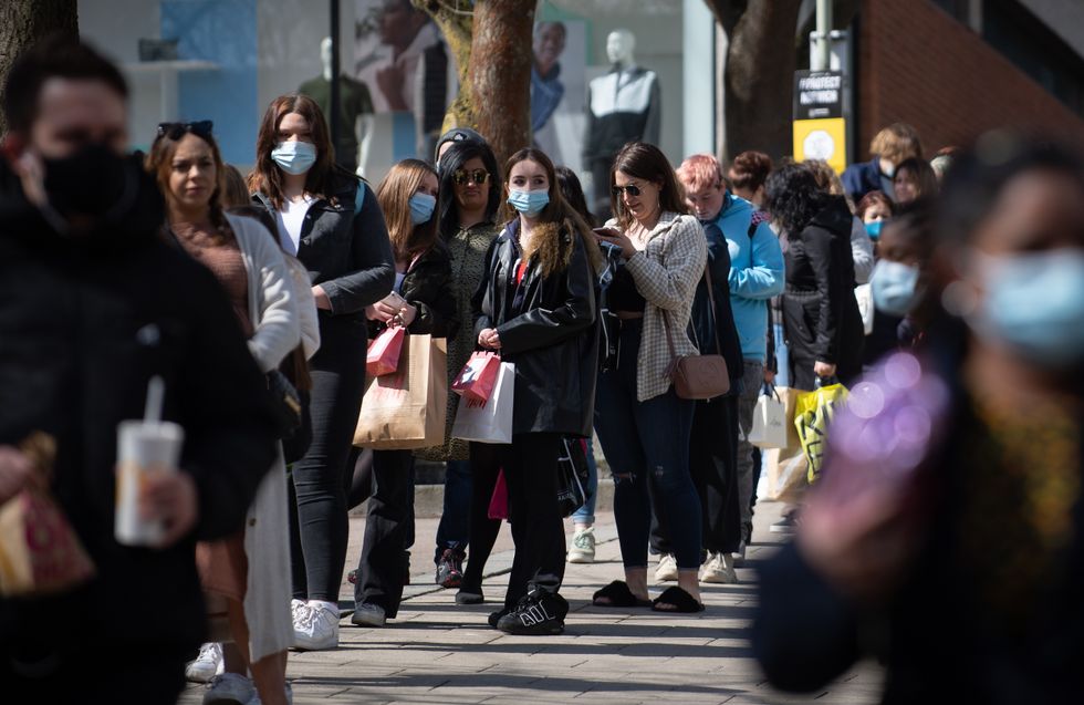 Shoppers queue outside Primark in Norwich.