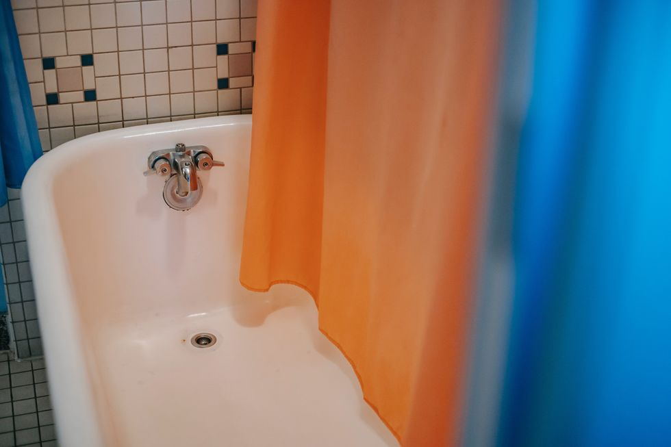 Shower curtain in shower