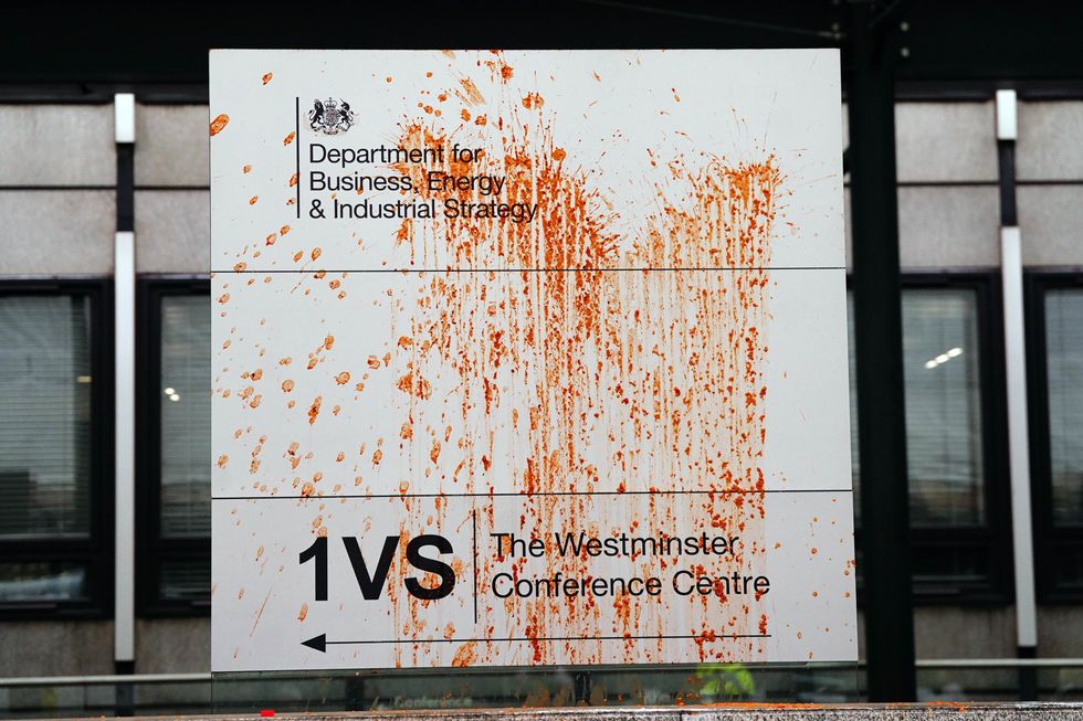 Signage for the Department for Business, Energy & Industrial Strategy in Victoria Street, central London, after a substance was thrown over it by an activist wearing a Just Stop Oil high-vis vest. Picture date: Monday October 17, 2022.