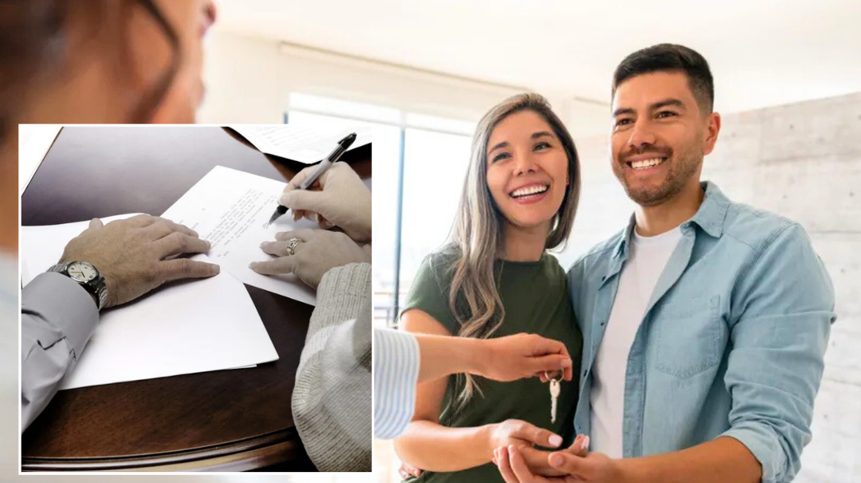 Signing documents / couple getting keys to home