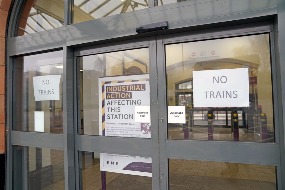 Signs at the closed Kettering station