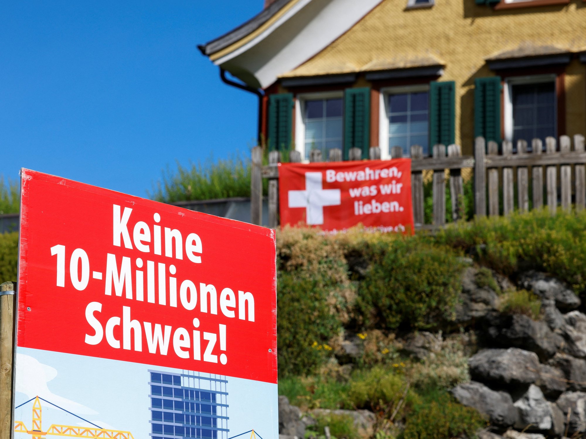 Signs in Switerland telling people about the 10 million population cap referendum