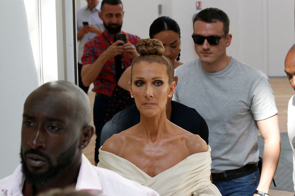 Singer Celine Dion and Pepe Munoz arrive to attend the Haute Couture