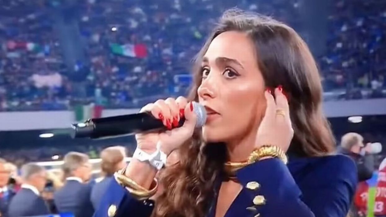 Singer Ellynora giving her rendition of the England national anthem