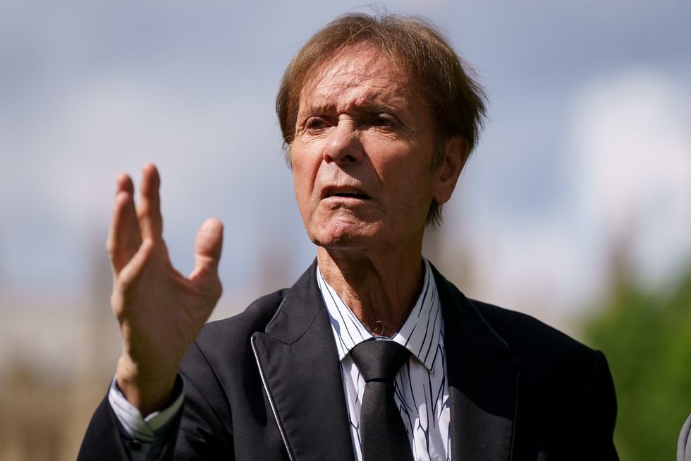 Singer Sir Cliff Richard speaks to the media outside the Palace of Westminster in London. Sir Cliff Richard, DJ Paul Gambaccini, and Daniel Janner QC have revived a campaign calling for suspects to have their anonymity protected by law unless they are charged. Picture date: Wednesday June 8, 2022.