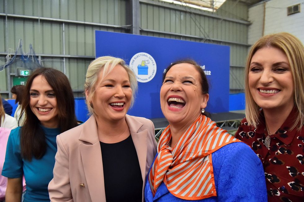 Sinn Fein deputy leader Michelle O'Neill, party leader Mary Louise McDonald and party candidates Emma Sheerin and Linda Dillon celebrate, after Sinn Fein were voted as the largest party in Northern Ireland, at the Meadowbank Sports Arena count centre, in Magherafelt, Northern Ireland