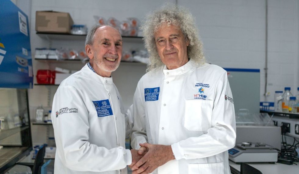 Sir Brian May pictured with professor Glyn Hewinson from the Centre of Excellence for Bovine TB at Aberystwyth University