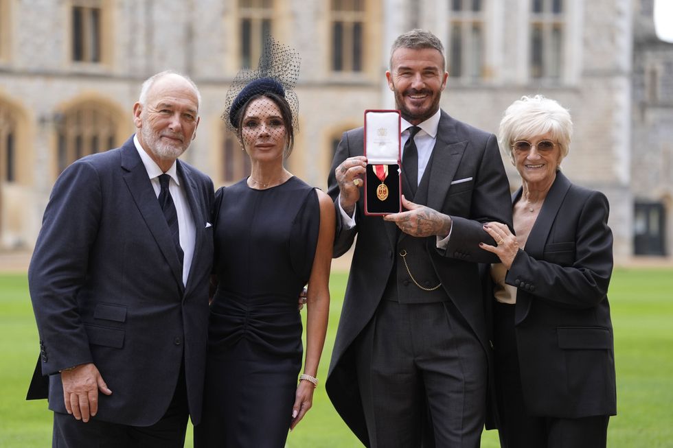 Sir David Beckham with his parents and wife Victoria