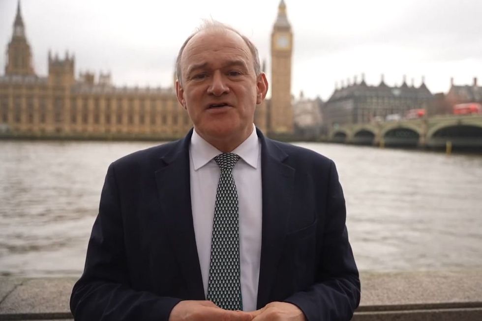 Sir Ed Davey delivered his New Year message opposite the Hoapplys of Parliament