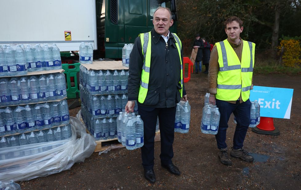 Sir Ed Davey distributing water in Tunbridge Wells
