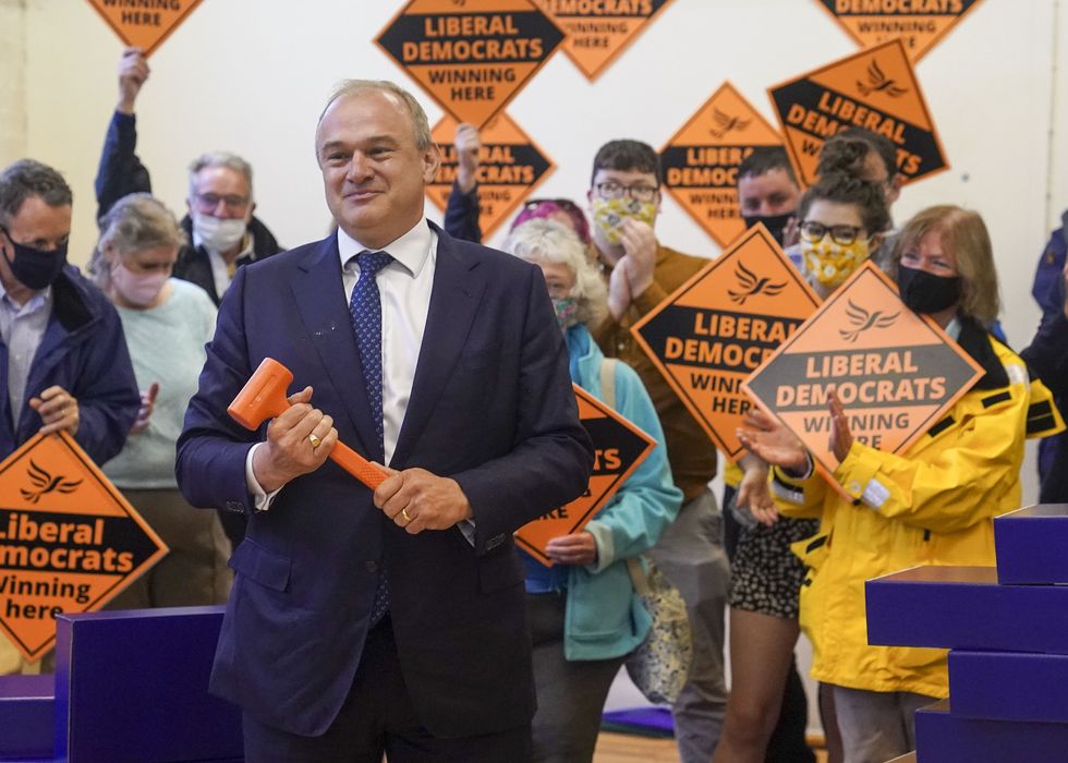 Sir Ed Davey smashing bricks out of the Blue Wall after the 2021 Chesham & Amersham by-election