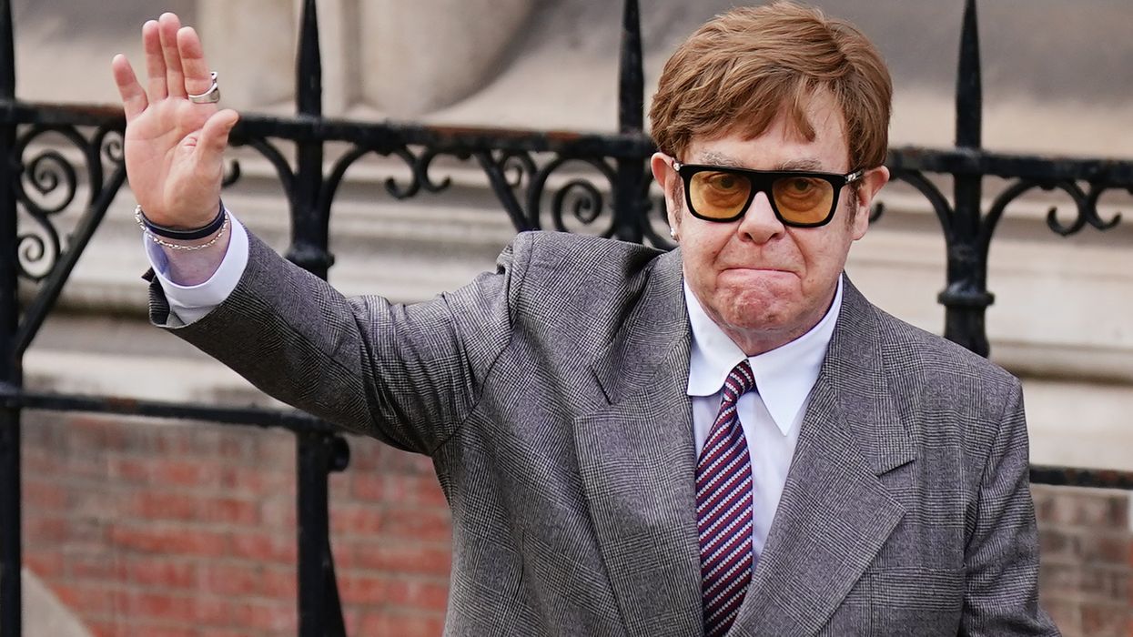 Sir Elton John waving