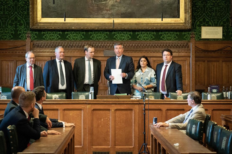 Sir Graham Brady (4th from left) announces which MPs have gained the support of the 20 MPs