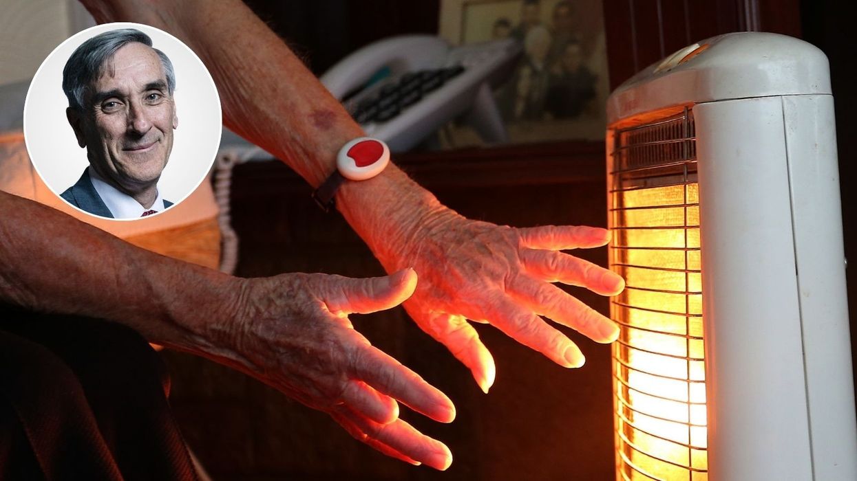Sir John Redwood and cold pensioner putting hands near a heater