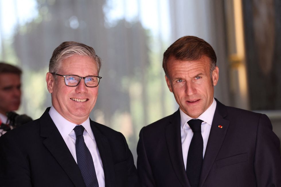 Sir Keir pictured with Mr Macron as the pair arrive in Egypt ahead of Gaza summit