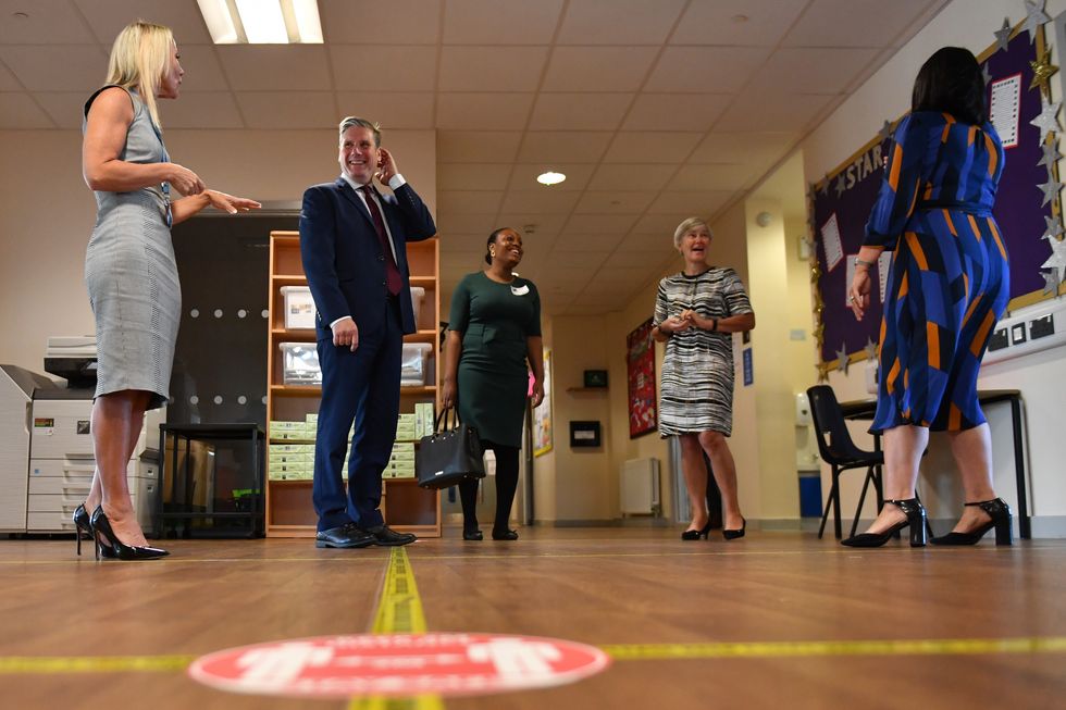 Sir Keir Starmer alongside Taiwo Owatemi