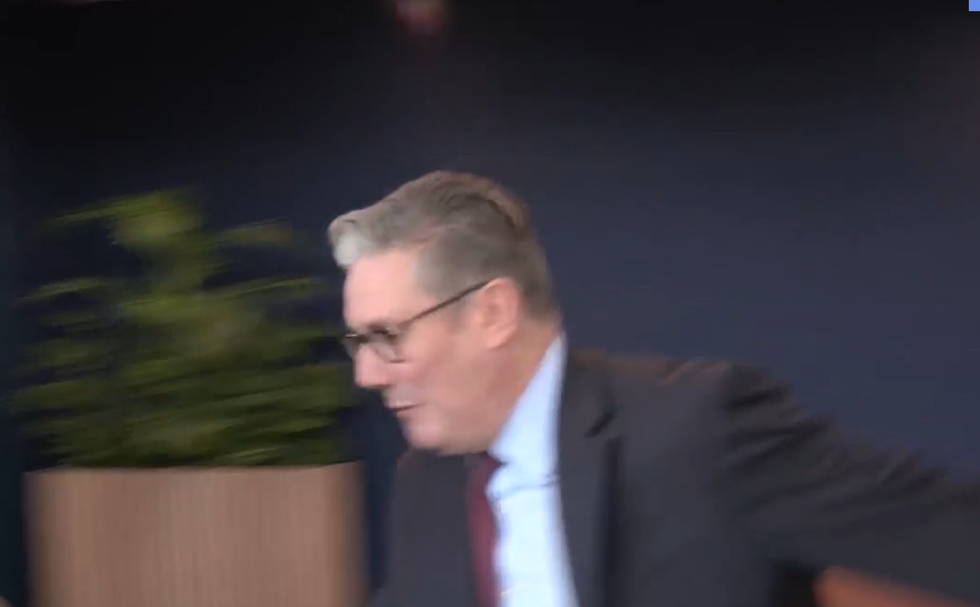 Sir Keir Starmer taking a tumble