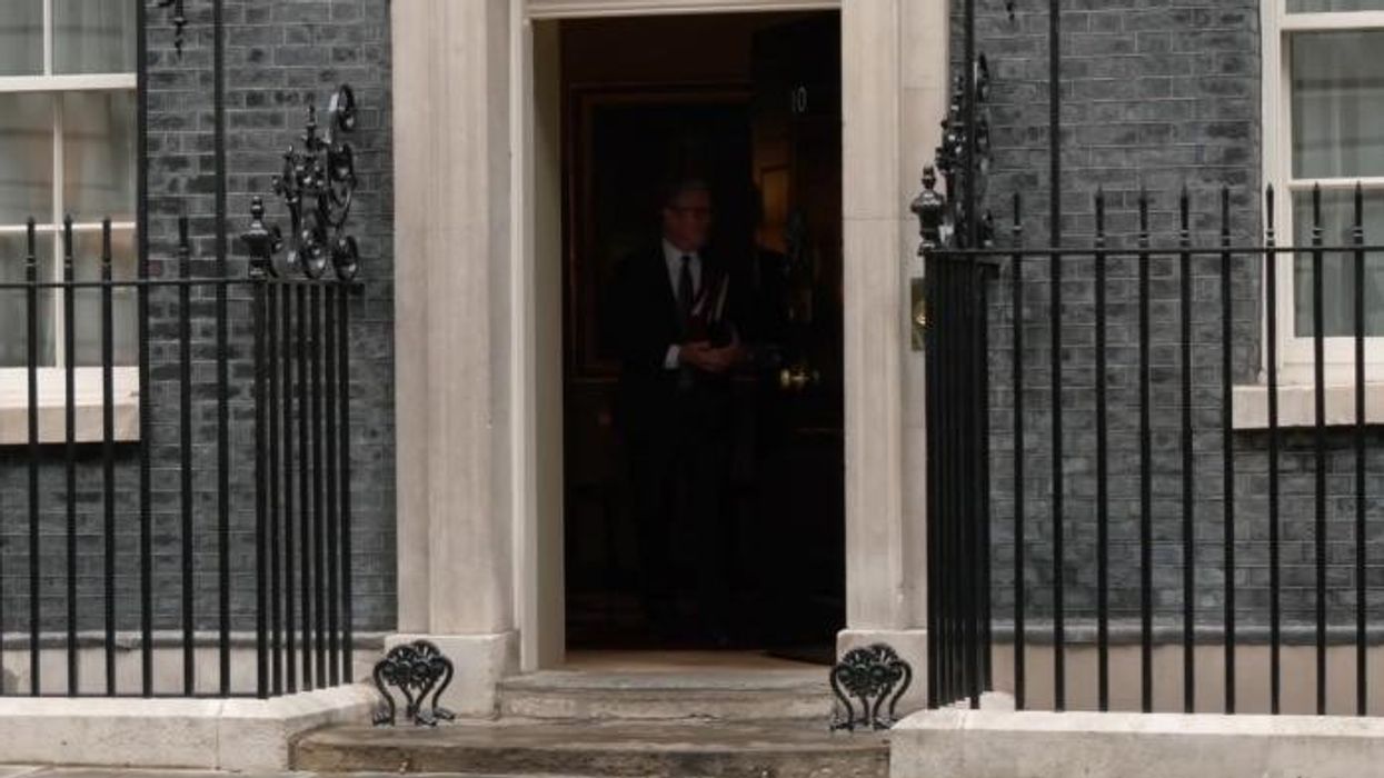 WATCH: Keir Starmer takes a stumble out of Downing Street amid rising pressure ahead of high-stakes PMQs clash