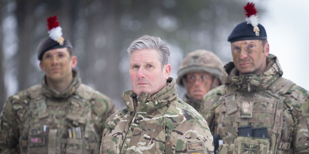 NextImg:'Sticks in the craw!' Starmer sparks fury after 'cosplaying' in military garb in Estonia