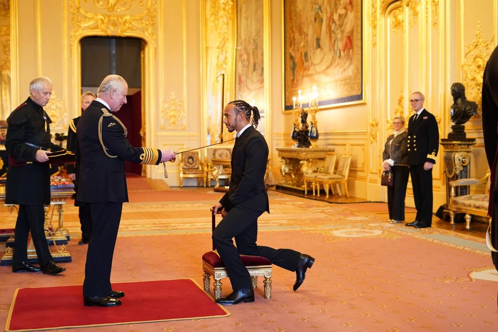 Sir Lewis Hamilton is made a Knight Bachelor by the Prince of Wales at Windsor Castle. Picture date: Wednesday December 15, 2021.
