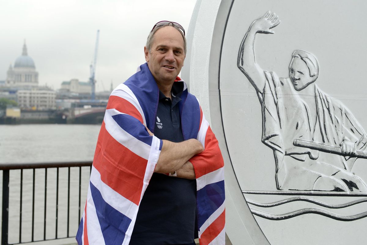 Sir Steve Redgrave stands in front of a giant medallion, featuring his face and a Olympic celebratory pose, on the Southbank, London, during the launch of Our Greatest Team Legends Collection