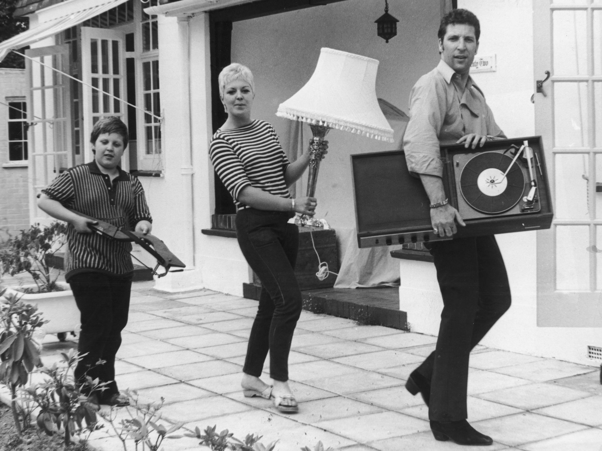 Sir Tom Jones and his wife and son