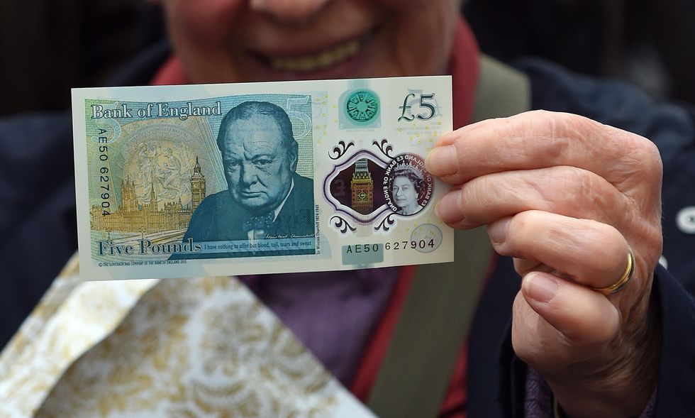 Sir Winston Churchill appearing on a \u00a35 banknote