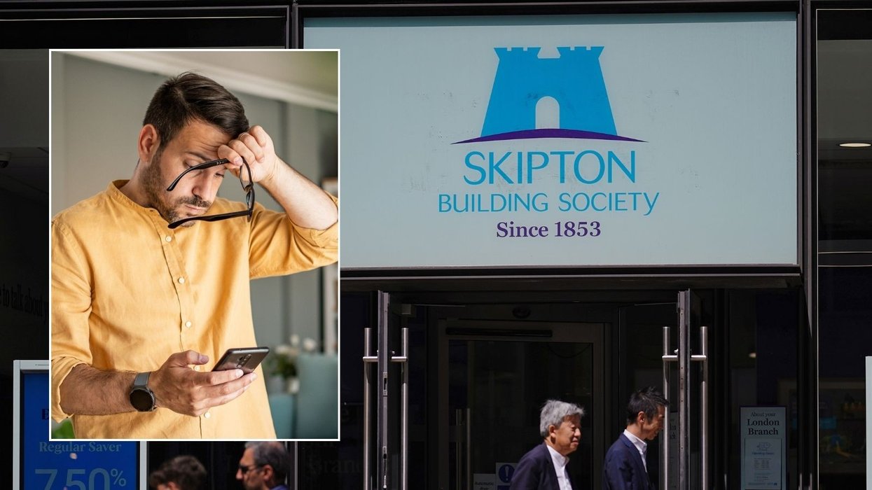 Skipton Building Society and man looking stressed