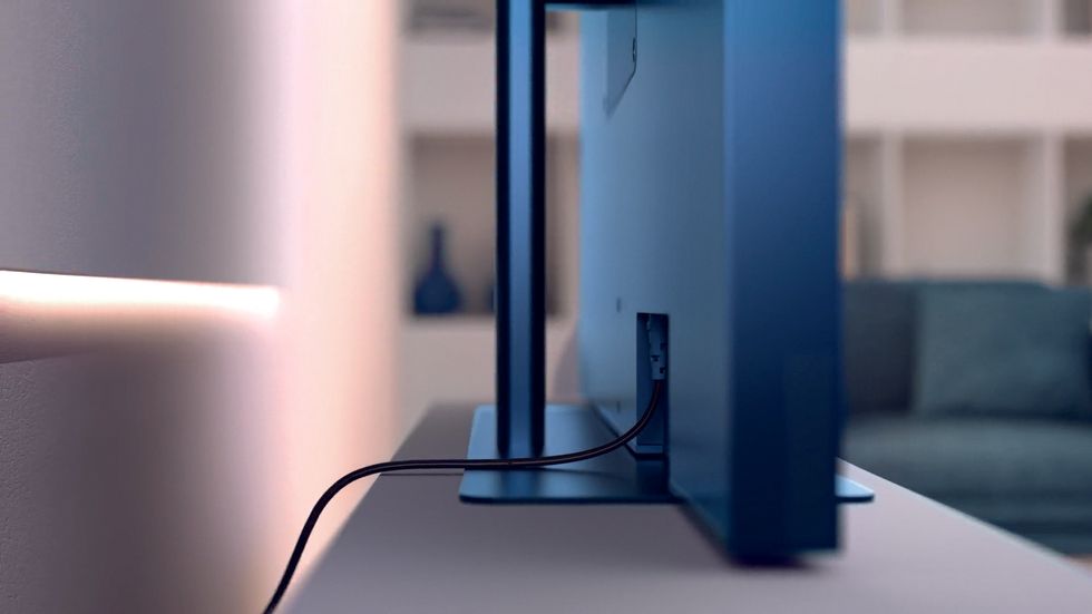 sky glass tv from the side showing the single charging cable