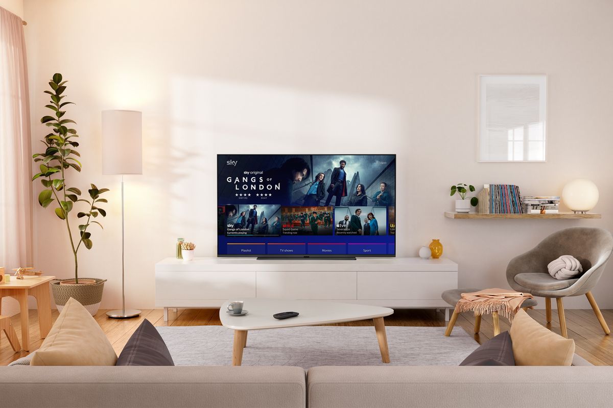 sky glass tv pictured in a living room showing gangs of london on-screen