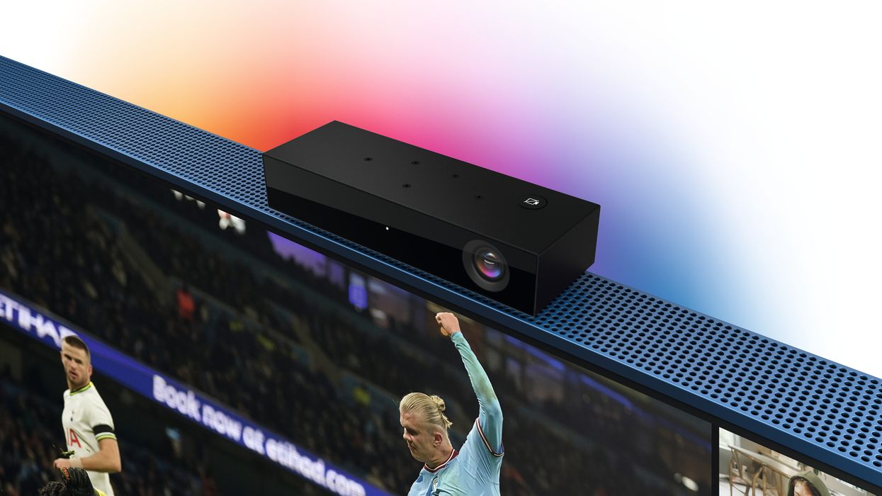 sky glass tv with sky live camera mounted on the frame showing people watching football from different homes in the UK together