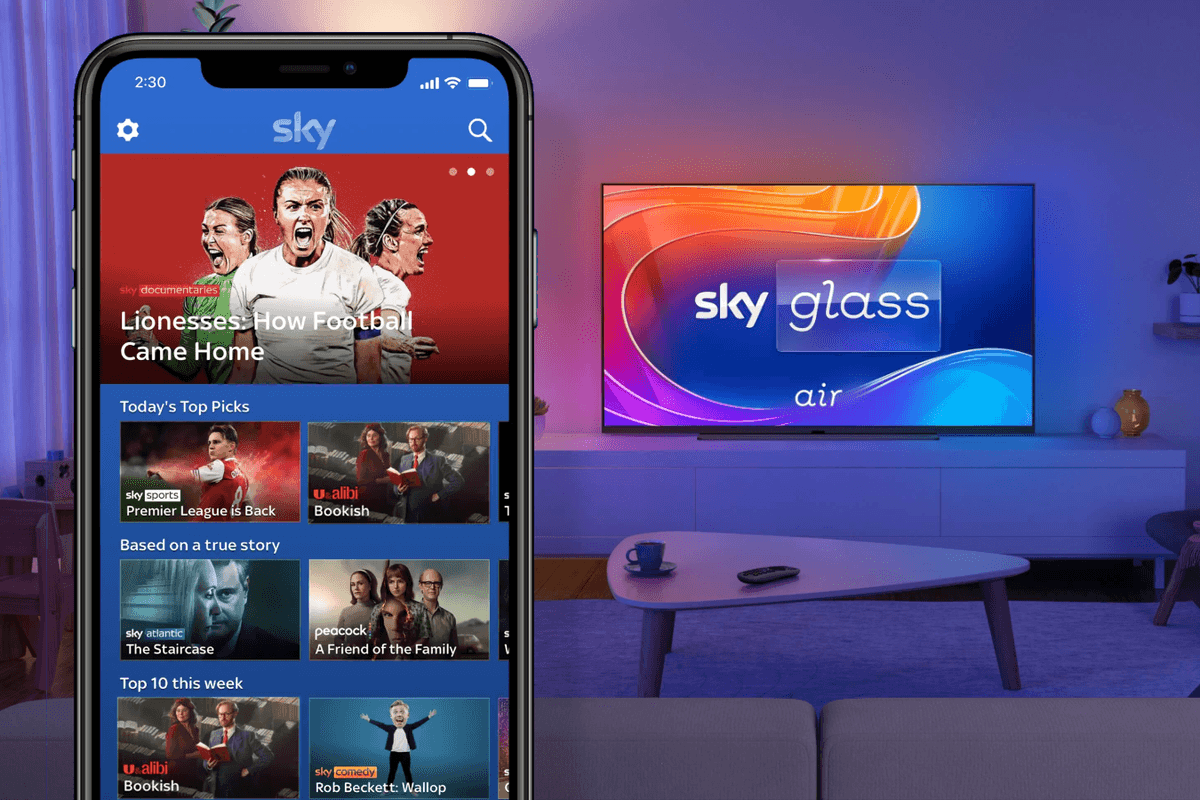 Sky Go app pictured on a smartphone and Sky Glass Air television in the background