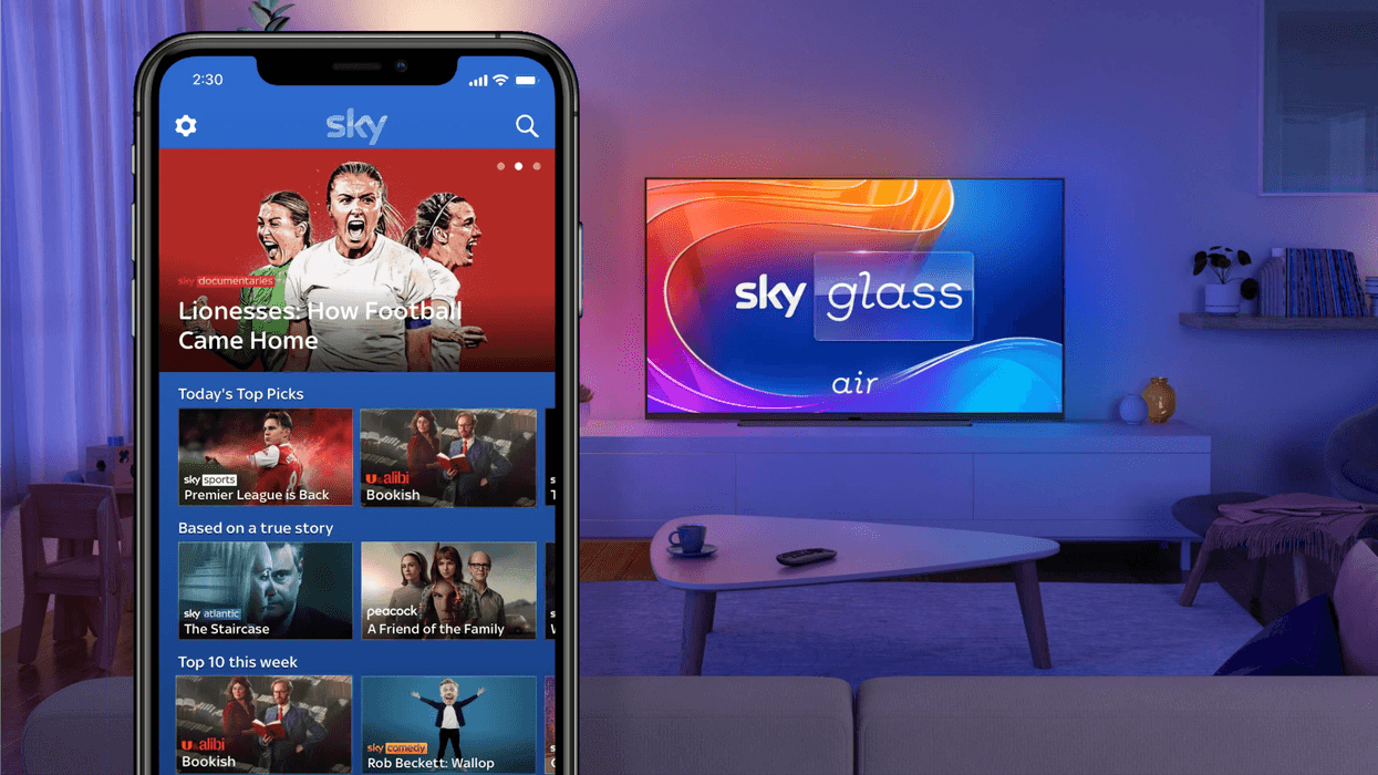 Sky Go app pictured on a smartphone and Sky Glass Air television in the background