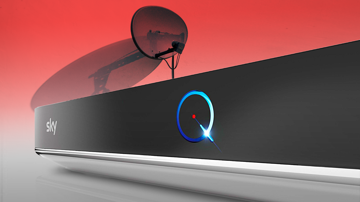 Sky Q box with a satellite dish in the background in red