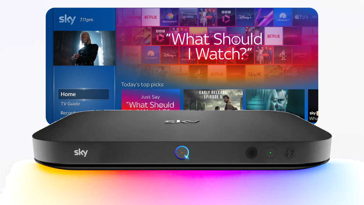 sky q box with colourful background with a screen from the TV behind it