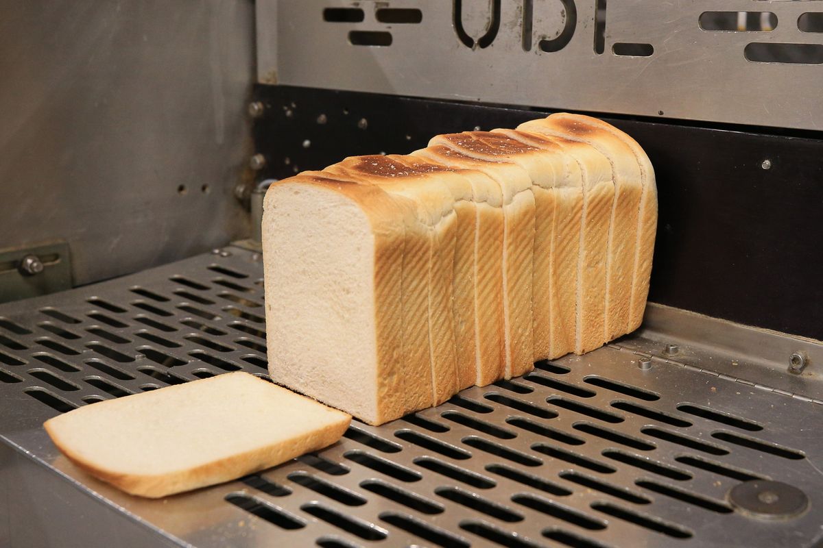 Slices of bread leaving the oven